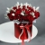 Композиция в шляпной коробке "Яна" из 45 красных роз, лимониума и лагуруса в Чехове